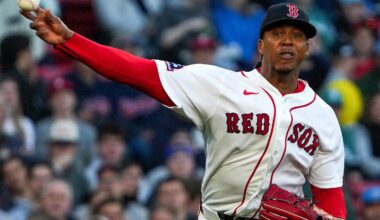 Red Sox pitcher Brayan Bello fires to first base for the out after fielding a grounder in the second inning.