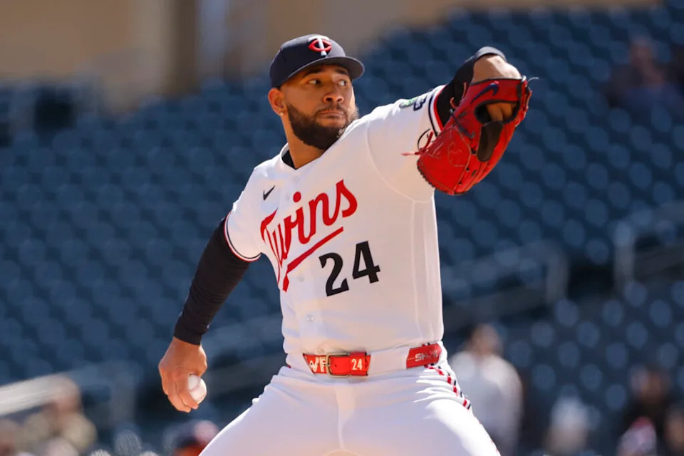 Minnesota Twins starting pitcher Simeon Woods Richardson (24) throws to the Tampa Bay Rays in the second inning at Target Field.
