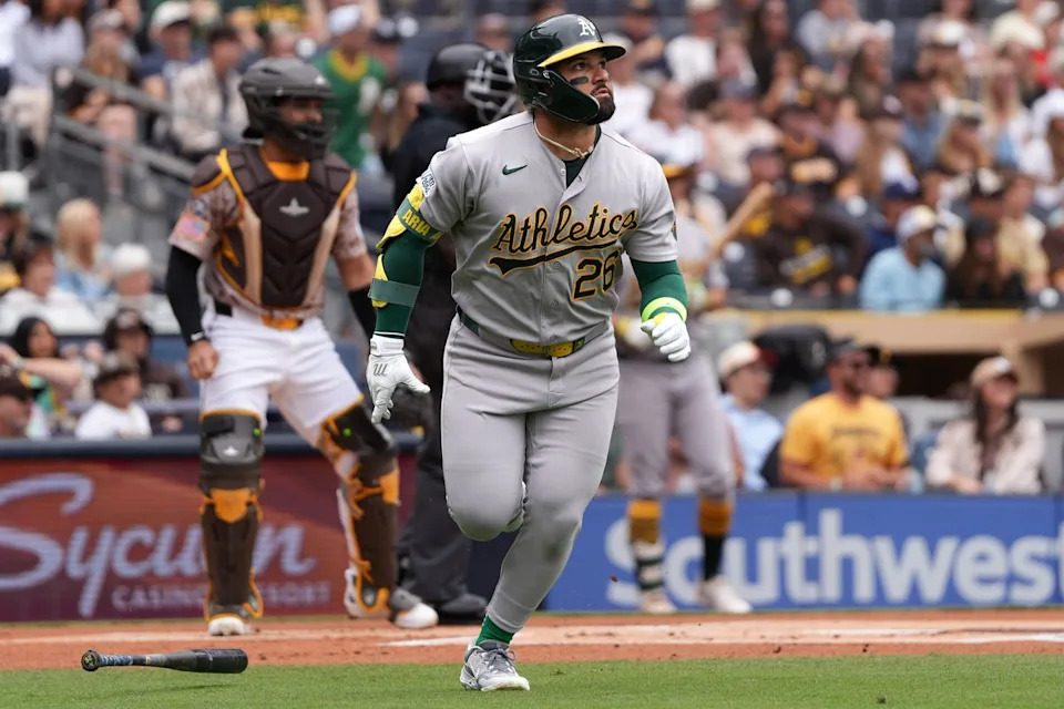 Athletics right fielder Carlos Cortes (26) watches the ball after hitting a home run during an MLB baseball game against the Padres, Sunday May 24, 2026 in San Diego, California.