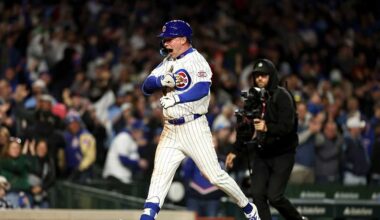 Busch and Crow-Armstrong help Cubs beat Reds 7-6 for their 8th straight win