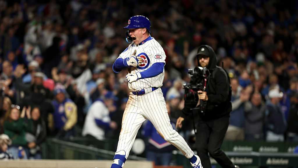 Busch and Crow-Armstrong help Cubs beat Reds 7-6 for their 8th straight win