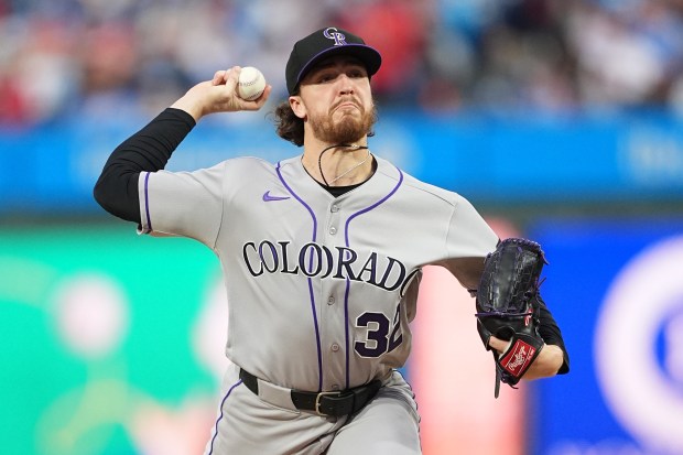 Colorado Rockies' Chase Dollander pitches during the first inning of a baseball game against the Philadelphia Phillies, Friday, May 8, 2026, in Philadelphia. (AP Photo/Matt Rourke)