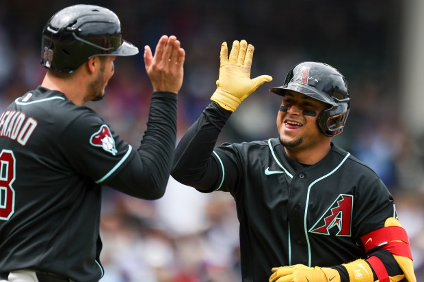 Arizona Diamondbacks catcher Gabriel Moreno (14) celebrates after hitting a two-run home run in the second inning against the Chicago Cubs at Wrigley Field on May 3, 2026. (Eileen T. Meslar/Chicago Tribune)
