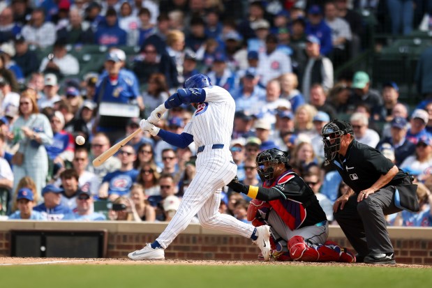 Chicago Cubs second baseman Nico Hoerner (2) hits a double in the eighth inning against the Arizona Diamondbacks at Wrigley Field on May 3, 2026. (Eileen T. Meslar/Chicago Tribune)