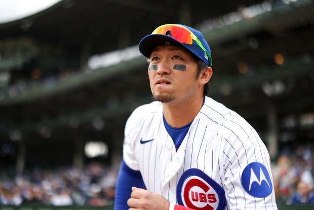 Chicago Cubs right fielder Seiya Suzuki (27) runs onto the field to warm up before the game against the Arizona Diamondbacks at Wrigley Field on May 3, 2026. (Eileen T. Meslar/Chicago Tribune)