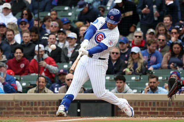 Cubs Michael Conforto (20) hits a home run against the Reds in the second inning at Wrigley Field on, May 7, 2026. (Terrence Antonio James/Chicago Tribune)