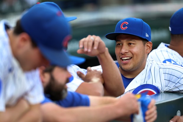 Cubs designated hitter Moisés Ballesteros has a laugh with his teammates in the dugout before a game against the Brewers on Tuesday, May 19, 2026, at Wrigley Field. (Chris Sweda/Chicago Tribune)