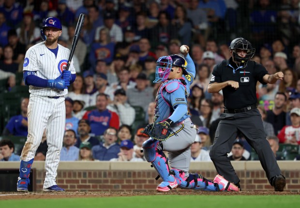 Chicago Cubs first baseman Michael Busch (29) stands at the plate after striking out in the eighth inning of a game against the Milwaukee Brewers at Wrigley Field in Chicago on May 19, 2026. (Chris Sweda/Chicago Tribune)
