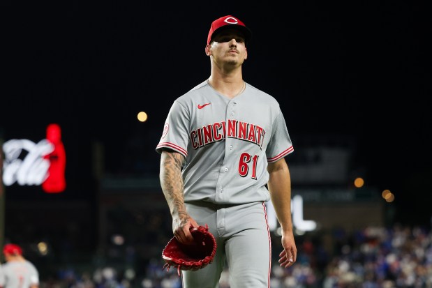 Reds pitcher Chase Petty (61) walks to the dugout after being taken out by Reds manager Terry Francona during the sixth inning against the Cubs at Wrigley Field May 4, 2026, in Chicago. (Armando L. Sanchez/Chicago Tribune)