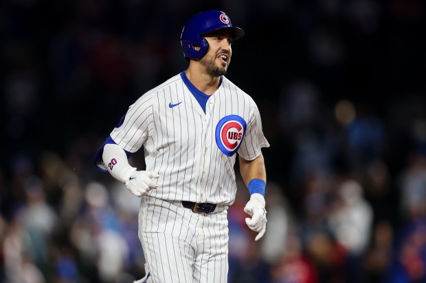Cubs right fielder Michael Conforto (20) runs the bases after hitting a walk-off homer to give the Cubs a, 5-4, win against the Reds during the ninth inning at Wrigley Field May 4, 2026, in Chicago. (Armando L. Sanchez/Chicago Tribune)