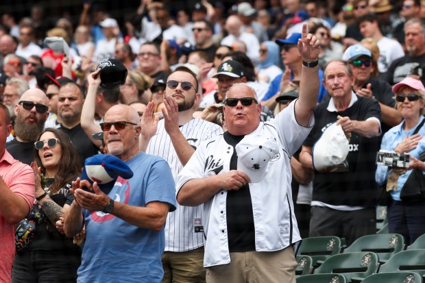 Chicago Cubs and Chicago White Sox fans cheer at the end of the national anthem before the game between the Chicago White Sox and the Chicago Cubs at Rate Field on May 17, 2026. (Eileen T. Meslar/Chicago Tribune)