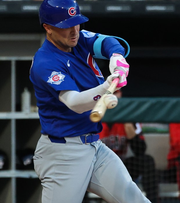 Cubs third baseman Alex Bregman makes contact with the ball for a fly ball out in the third inning against the White Sox at Rate Field on May 15, 2026, in Chicago. (John J. Kim/Chicago Tribune)