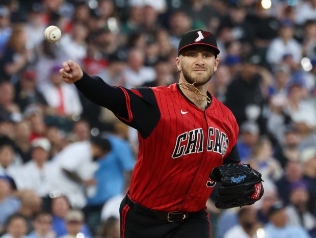 White Sox starting pitcher Sean Burke throws to first base in the fifth inning against the Cubs at Rate Field on May 15, 2026, in Chicago. (John J. Kim/Chicago Tribune)