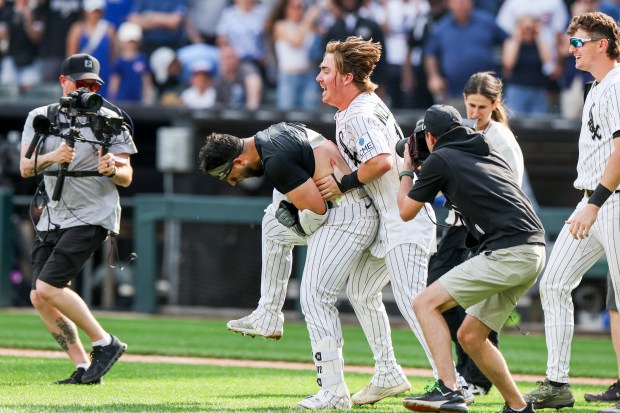 Chicago White Sox second baseman Chase Meidroth (10) celebrates with catcher Edgar Quero (26) after he hit a two-run home run during the 10th inning to defeat the Chicago Cubs 9-8 at Rate Field on May 17, 2026. (Eileen T. Meslar/Chicago Tribune)