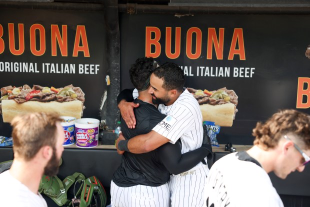 Chicago White Sox right fielder Derek Hill (25) hugs catcher Edgar Quero (26) after he hit a two-run home run during the 10th inning to defeat the Chicago Cubs 9-8 at Rate Field on May 17, 2026. (Eileen T. Meslar/Chicago Tribune)