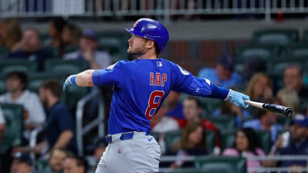 Cubs left fielder Ian Happ hits a solo home run in the eighth inning against the Braves on May 14, 2026, in Atlanta. (Todd Kirkland/Getty)