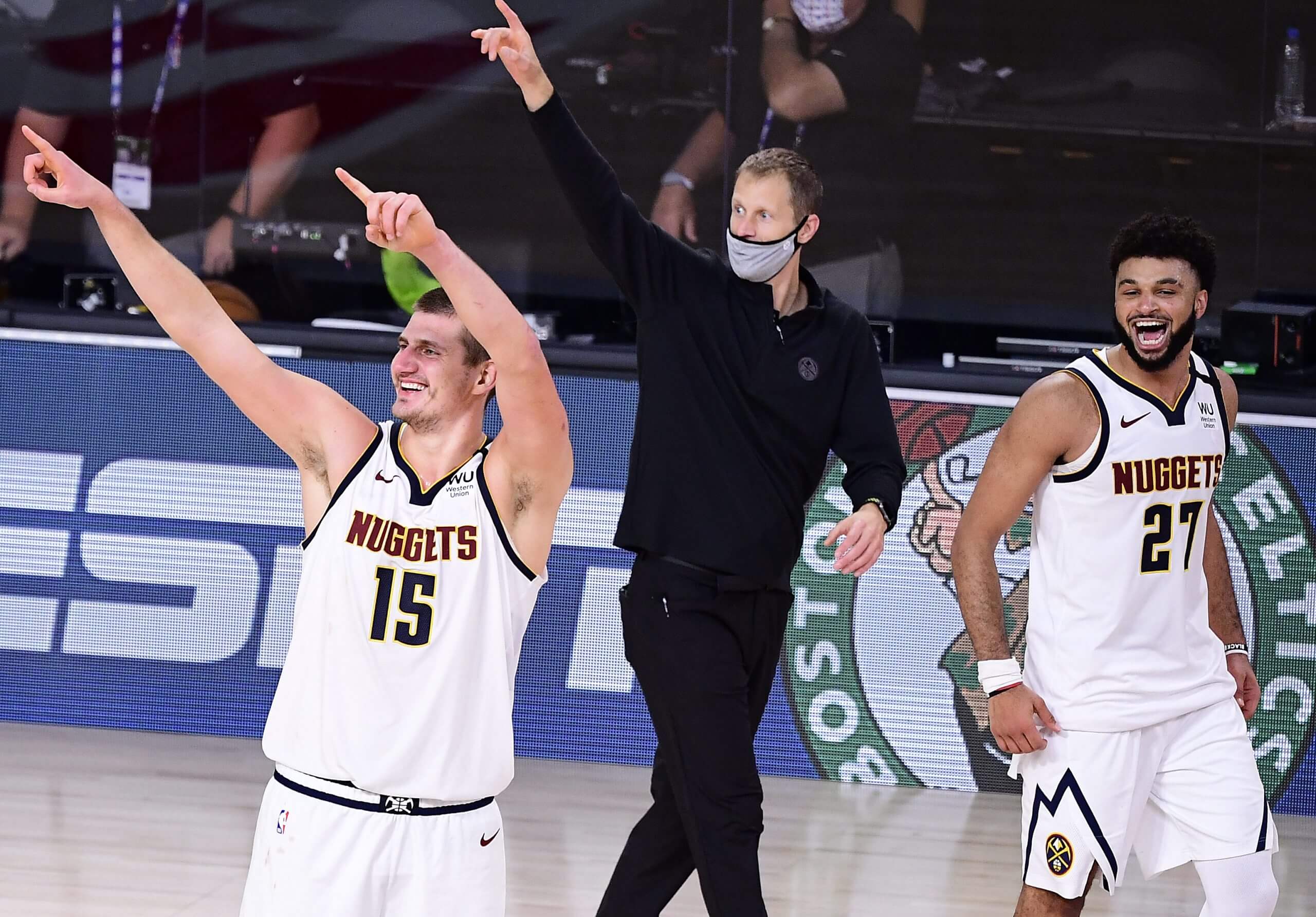 Nikola Jokić (left) and Jamal Murray of the Denver Nuggets celebrate their win over the LA Clippers in Game 7 of the Western Conference's second round during the 2020 NBA playoffs.