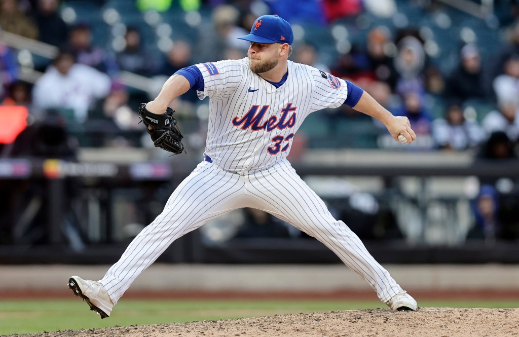A.J. Minter pitches against the Miami Marlins at Citi Field on April 08, 2025 in New York City. The Mets defeated the Marlins 10-5. 