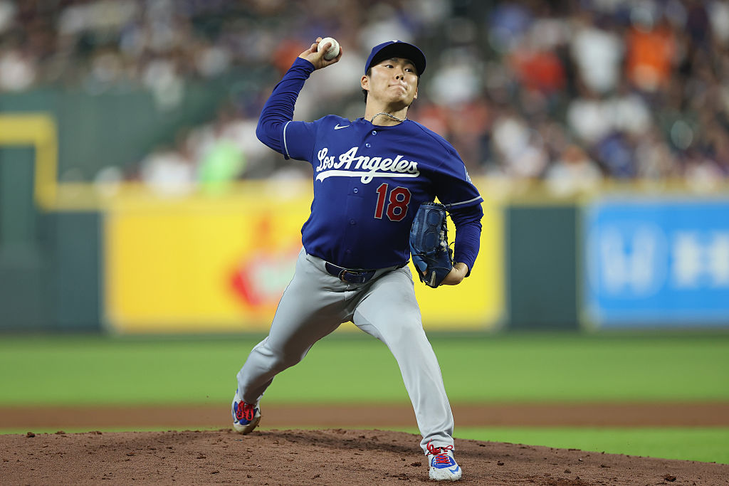 HOUSTON, TEXAS - MAY 04: Yoshinobu Yamamoto #18 of the Los Angeles Dodgers pitches in the first inning against the Houston Astros at Daikin Park on May 04, 2026 in Houston, Texas. (Photo by Tim Warner/Getty Images)