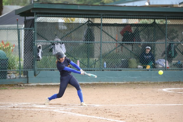 Hailey Shepherd swinging in early-season action. She would have two hits in South Fork's final playoff game. (Phoebe Becker)