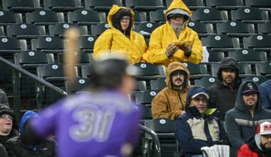 Colorado Rockies hold on, beat Texas Rangers 7-6 at cold, rainy Coors Field