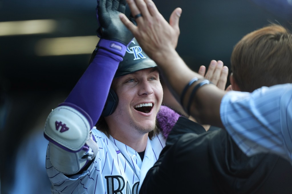 Jake McCarthy's grand slam lifts Rockies to victory amid sparse attendance at Coors Field