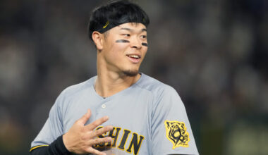 Mar 15, 2025; Bunkyo, Tokyo, Japan; Hanshin Tigers right fielder Teruaki Sato (8) during the fifth inning against the Chicago Cubs at Tokyo Dome. Mandatory Credit: Darren Yamashita-Imagn Images