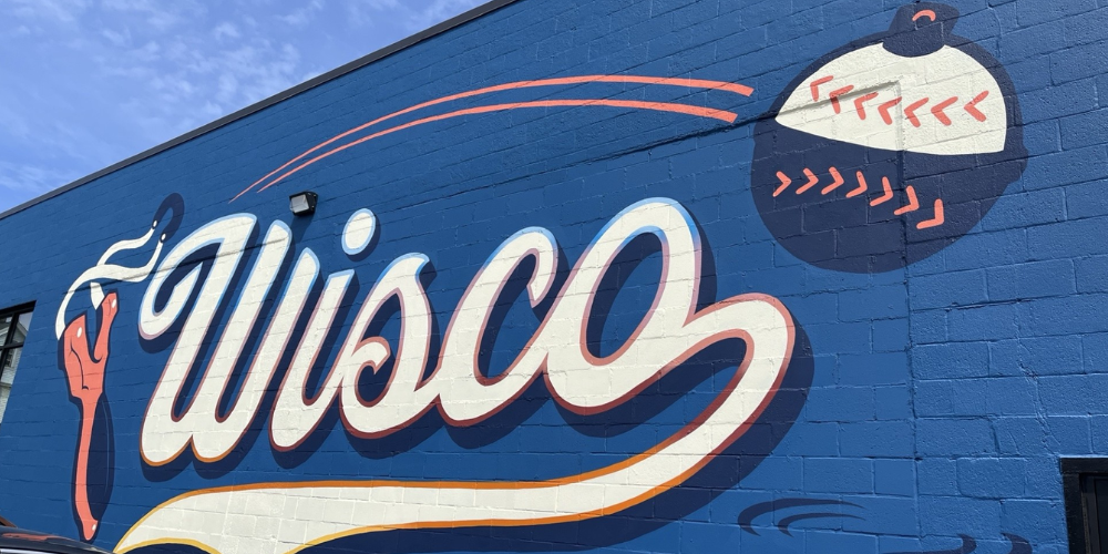 The new Brewers mural "The Launch" on Slingshot Bar exterior.