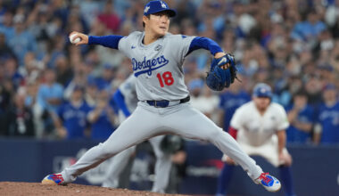 Nov 1, 2025; Toronto, Ontario, CAN; Los Angeles Dodgers pitcher Yoshinobu Yamamoto (18) throws a pitch against the Toronto Blue Jays in the ninth inning for game seven of the 2025 MLB World Series at Rogers Centre. Mandatory Credit: Nick Turchiaro-Imagn Images