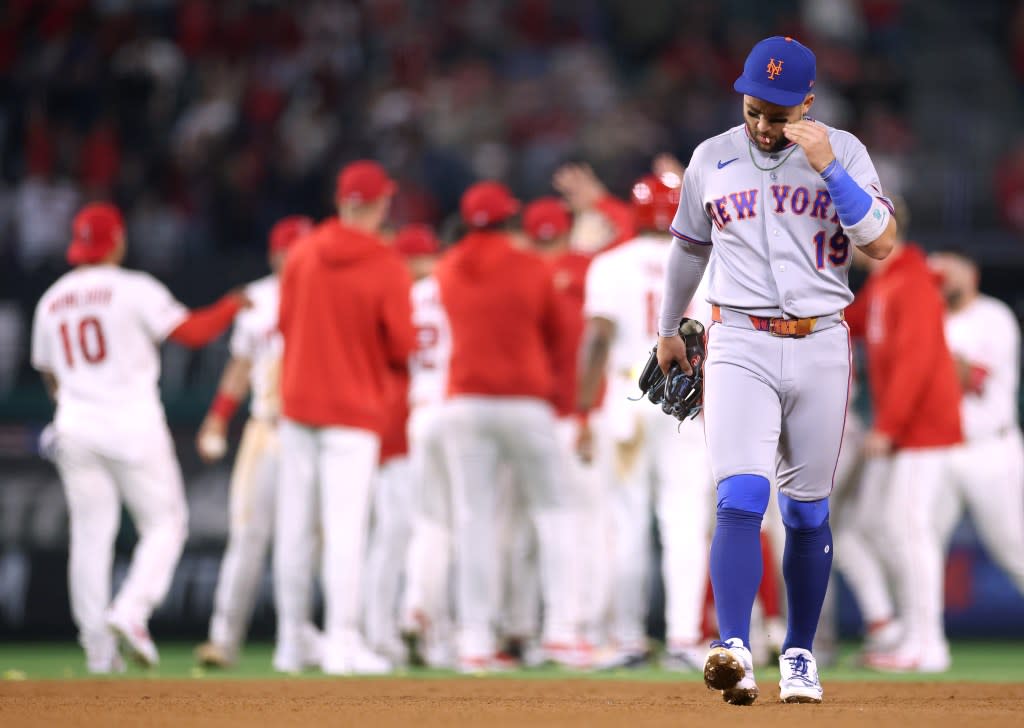 A dejected Bo Bichette walks off the field as the Angels celebrate in the background after their 4-3, 10-inning win over the Mets on May 2, 2026 in Anahiem, Calif. Getty Images