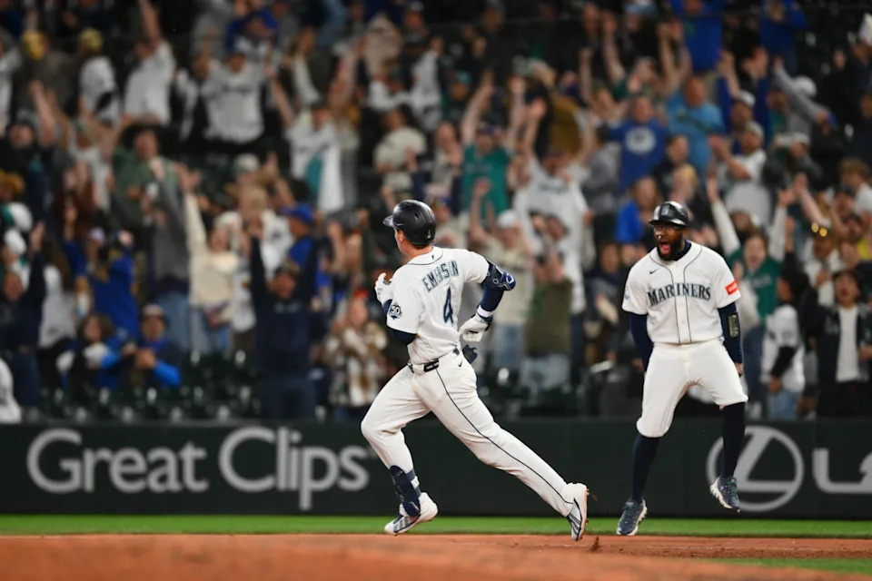 Seattle Mariners third baseman Colt Emerson (4) runs the bases after hitting a three-run home run during a game against the Chicago White Sox on Monday at T-Mobile Park in Seattle. | Steven Bisig/Imagn Images.
