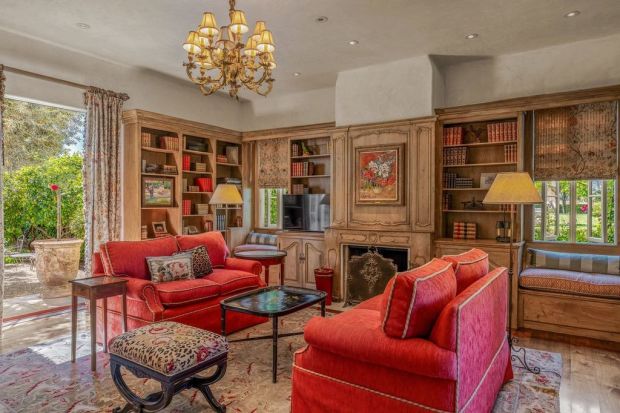 Parlor of Napa Valley estate with built in bookshelves.