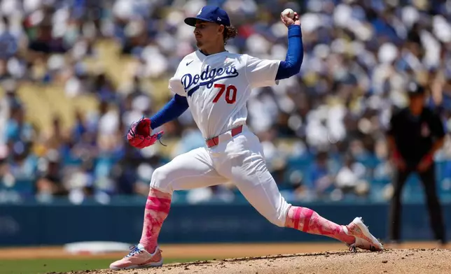 Los Angeles Dodgers starting pitcher Justin Wrobleski delivers to the plate during the third inning of a baseball game against the Atlanta Braves, Sunday, May 10, 2026, in Los Angeles. (AP Photo/Caroline Brehman)