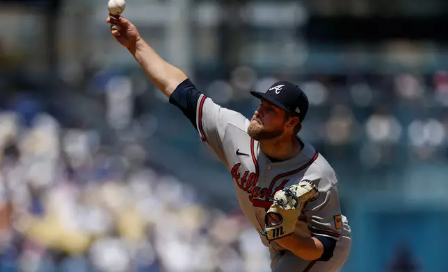 Atlanta Braves starting pitcher Bryce Elder delivers to the plate during the first inning of a baseball game against the Los Angeles Dodgers, Sunday, May 10, 2026, in Los Angeles. (AP Photo/Caroline Brehman)