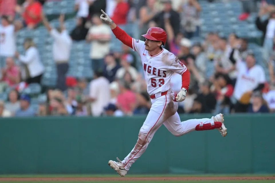 Los Angeles Angels left fielder Wade Meckler (53) rounds the bases on a three-run home run during the second inning against the Texas Rangers at Angel Stadium.