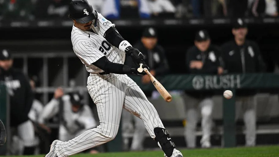 Miguel Vargas (20) hits a single against the Los Angeles Angels during the fifth inning at Rate Field