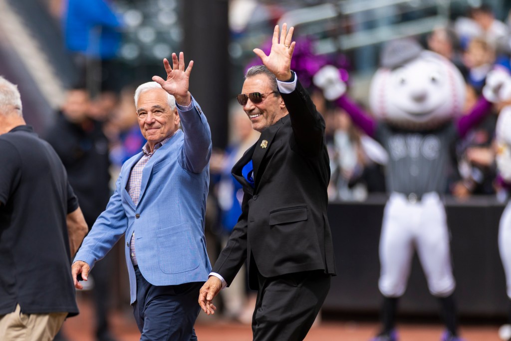 Lee Mazzilli and Bobby Valentine celebrate their induction into the Mets Hall of Fame.