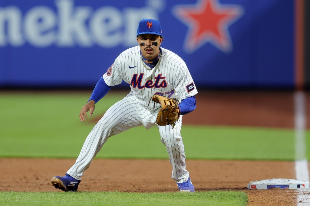 New York Mets first baseman Mark Vientos (27) plays first base against the Minnesota Twins during the third inning at Citi Field.