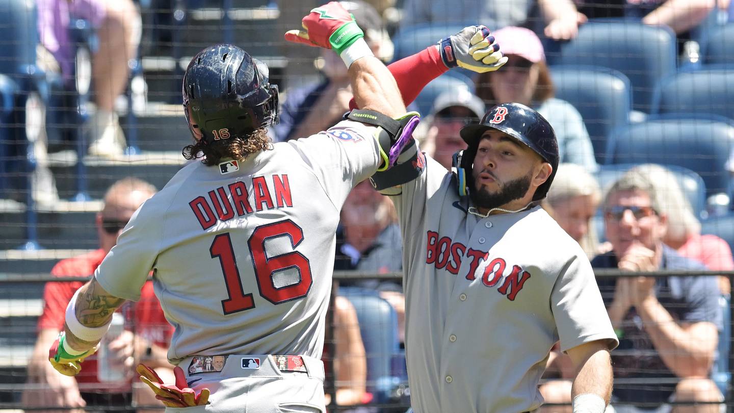 May 31, 2026; Cleveland, Ohio, USA; Boston Red Sox center fielder Jarren Duran (16) celebrates with first baseman Mickey Gasper (30) after hitting a home run during the first inning against the Cleveland Guardians at Progressive Field. Mandatory Credit: Ken Blaze-Imagn Images