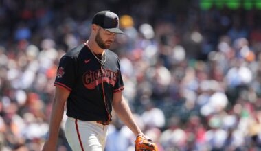 May 23, 2026; San Francisco, California, USA; San Francisco Giants starting pitcher Adrian Houser (12) walks to the dugout after being removed from the game against the Chicago White Sox during the fifth inning at Oracle Park. Mandatory Credit: Darren Yamashita-Imagn Images