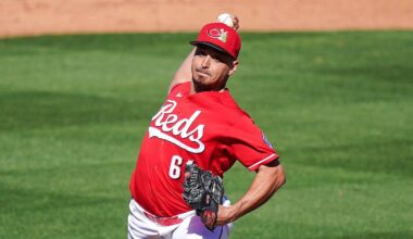 Cincinnati Reds pitcher Julian Garcia (61) throws a pitch