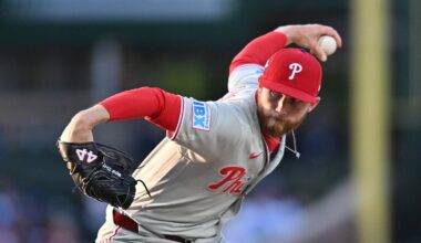 Apr 22, 2026; Chicago, Illinois, USA; Philadelphia Phillies pitcher Kyle Backhus (19) pitches against the Chicago Cubs during the first inning at Wrigley Field. Mandatory Credit: Patrick Gorski-Imagn Images