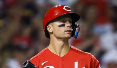 Cincinnati Reds shortstop Matt McLain (9) walks off the field