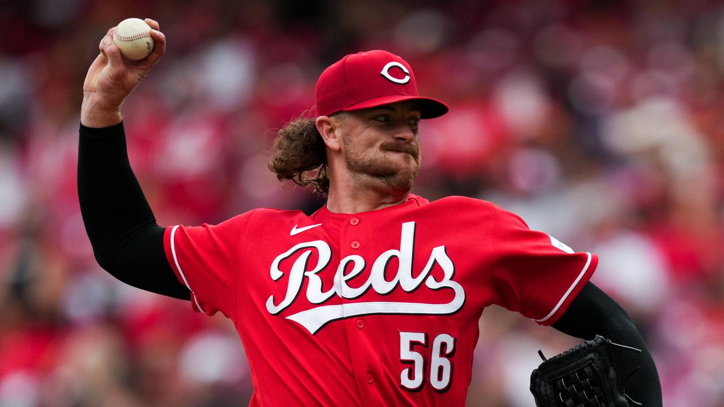 Cincinnati Reds pitcher Chris Paddack (56) throws