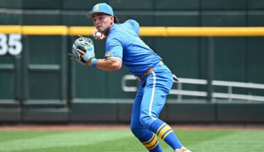 Jun 14, 2025; Omaha, Neb, USA;  UCLA Bruins shortstop Roch Cholowsky (1) completes a double play against the Murray State Racers during the second inning at Charles Schwab Field. Mandatory Credit: Steven Branscombe-Imagn Images