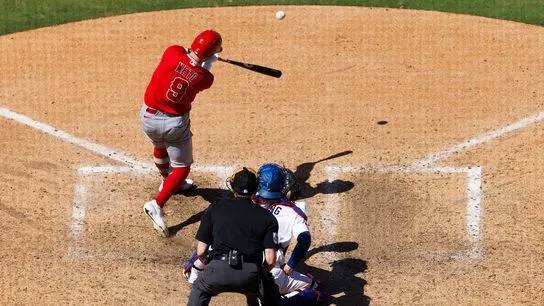Zach Neto #9 of the Los Angeles Angels hits a home run during the game against the Los Angeles Dodgers at Dodger Stadium on June 7, 2026 in Los Angeles, California.