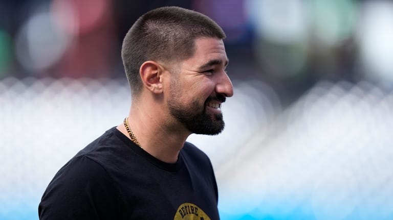 San Diego Padres' Nick Castellanos watches batting practice before a...