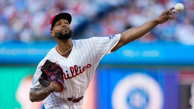 Philadelphia Phillies' Cristopher Sánchez pitches during the first inning of...