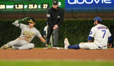 Kurtz drives in winning run in 10th as A's beat Cubs 5-4; Chicago's Happ reaches 1,000 career hits