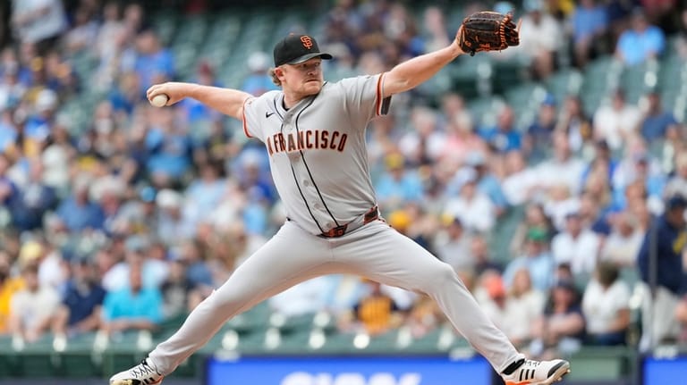 San Francisco Giants' Logan Webb pitches during the first inning...